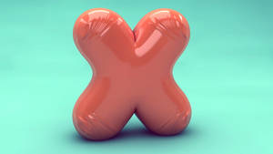 Close-up Of A Balloon Shaped As Letter X Wallpaper