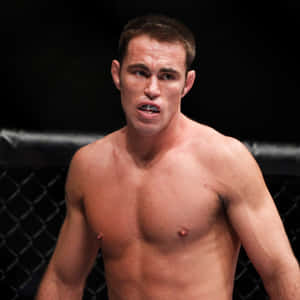 Close Up Of Jake Shields At Ufc Octagon Wallpaper