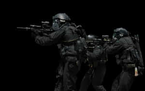 Close-up Of Swat Team Preparing For Mission Wallpaper