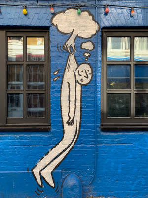 Cloud Grabs Man Street Art Wallpaper