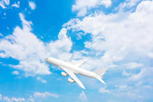 Cloudy Blue Sky Plane Background Wallpaper