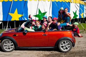 Clown Car Extravaganza Circus Tent Background Wallpaper