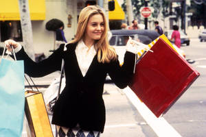 Clueless Alicia With Shopping Bags Wallpaper
