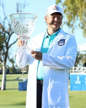 Coat And Trophy Of Retief Goosen Wallpaper