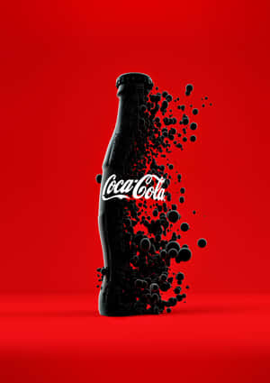 Coca Cola Bottle With Black Splashes On A Red Background Wallpaper