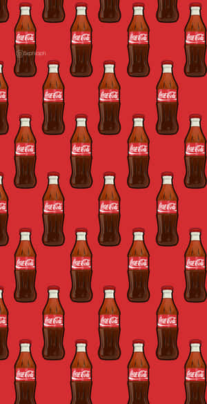 Coca Cola Bottles On A Red Background Wallpaper