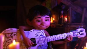 Coco Miguel Playing Guitar Wallpaper