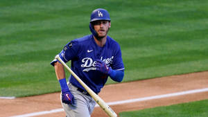 Cody Bellinger Running In Field Wallpaper