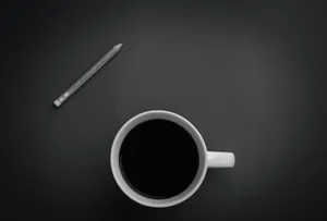Coffee And Pencil On Black Tablet Wallpaper