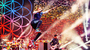 Coldplay Concert Chris Martin Jumping Wallpaper
