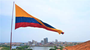 Colombia Flag In The City Wallpaper