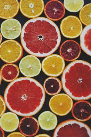 Colorful Citrus Slices Array Wallpaper