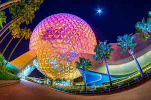 Colorful Epcot Globe With Trees Wallpaper