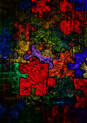 Colorful Grunge Puzzle Pieces Wallpaper