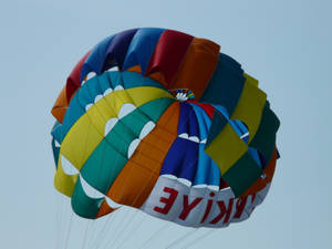 Colorful Parachutes For Parasailing Wallpaper