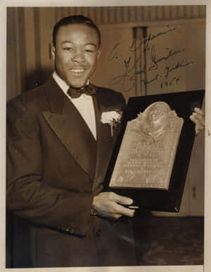 Commemorative Plaque Of Boxing Legend Kid Gavilan Wallpaper