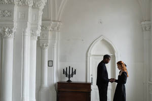 Condolence Man Consoling Woman Wallpaper