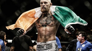 Conor Mcgregor With Ireland Flag Wallpaper