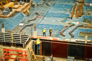 Construction Workers In The Midst Of Job Wallpaper