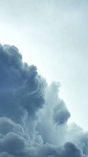 Contrast Of Blue And White Cloud Formations Wallpaper