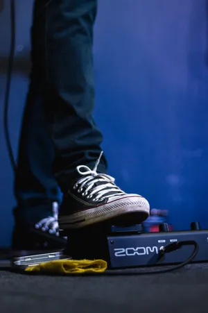 Converse Sneakers On Amplifier Wallpaper