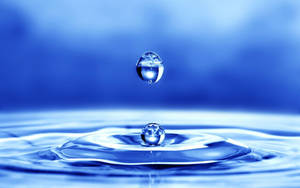 Cool 3d Water Droplets On Surface Wallpaper