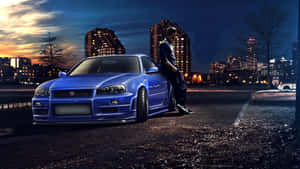 Cool Nissan Skyline With A Man Leaning On Its Side Wallpaper