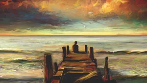 Cool Sad Boy At The Beach Wallpaper