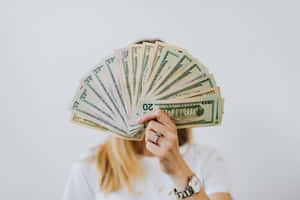 Cool Woman Holding Money Wallpaper