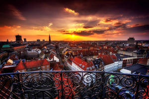 Copenhagen Balcony View Of Sunset Wallpaper