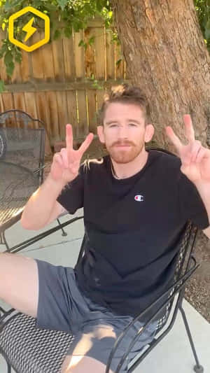 Cory Sandhagen Flashing A Double Peace Sign Wallpaper