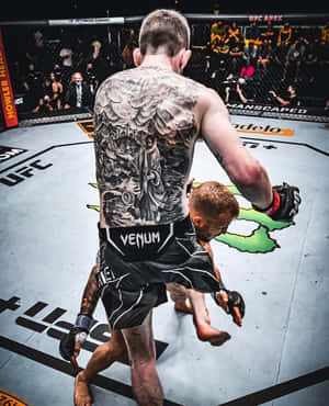 Cory Sandhagen Hitting Opponent With Knee Wallpaper