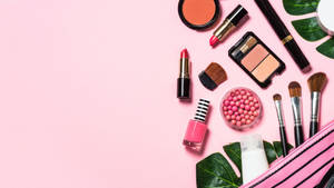 Cosmetics On Baby Pink Surface Wallpaper