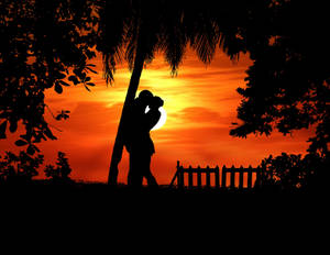 Couple Silhouette In Golden Time Wallpaper