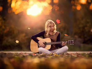 Cozy Autumn Girl Guitar Wallpaper