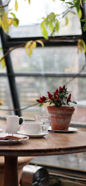 Cozy Cafe Table Setting Wallpaper