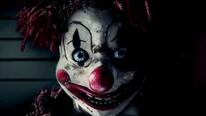 Creepy Smiling Clown Wallpaper