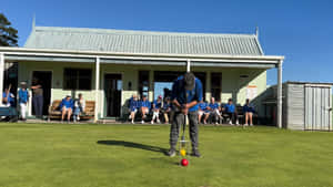 Croquet Player Concentrationat Club Wallpaper