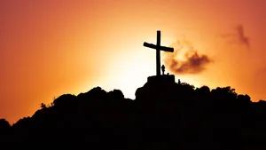 Cross With Ray Of Light Shining From Heaven Wallpaper