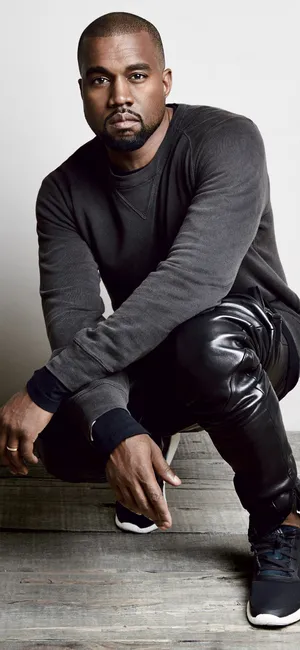 Crouched Kanye West Android Wallpaper