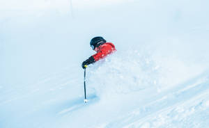 Crushing Snow Skiing Wallpaper