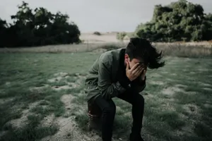 Crying In Pain At Field Wallpaper