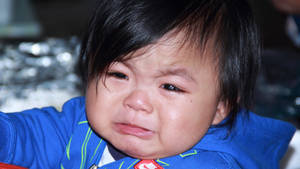Crying Sad Boy Heartrending Expression Wallpaper