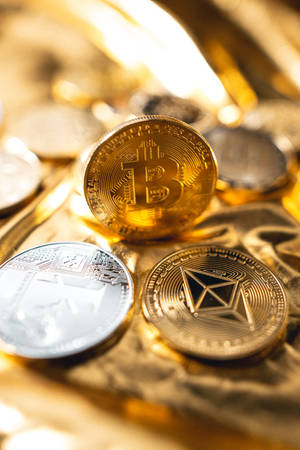Cryptocurrency Coins In Focus Shot Wallpaper