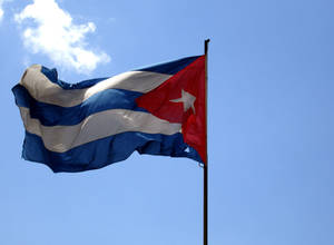 Cuban Flag With Clouds Background Wallpaper