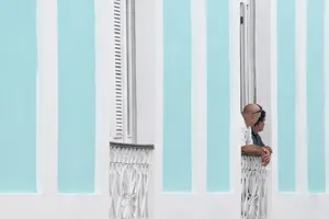 Cuban Girl On Balcony Wallpaper