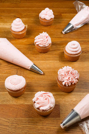 Cupcakes And Pastry Bags Wallpaper