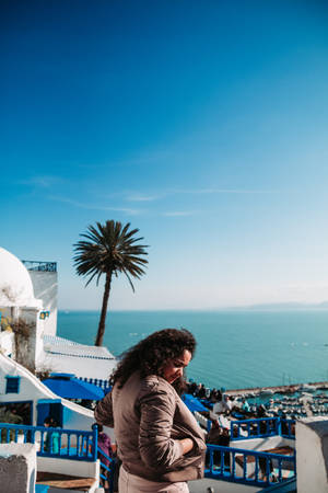 Curly-haired Lady In Tunisia Wallpaper