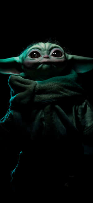 Cute And Adorable Baby Yoda On Iphone Wallpaper