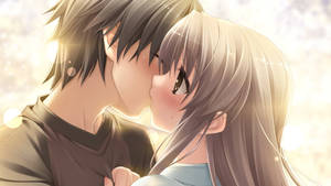 Cute Anime Couple Kiss In Soft Lighting Wallpaper